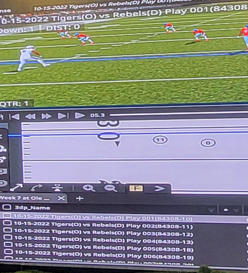 Photo of 3D Playbook in play creation mode projected onto a Walk Through Wall. Photo shows the field and play animation in the top third, the 2D Xs-and-Os drawing in the middle third and the names of plays in the series of reps in the bottom third of the screen.