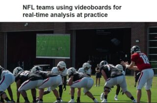 Photo capture from espn.com story about Atlanta Falcons using instant replace at practice shows the Falcons at the line of scrimmage in the foreground and the replay board in the background.